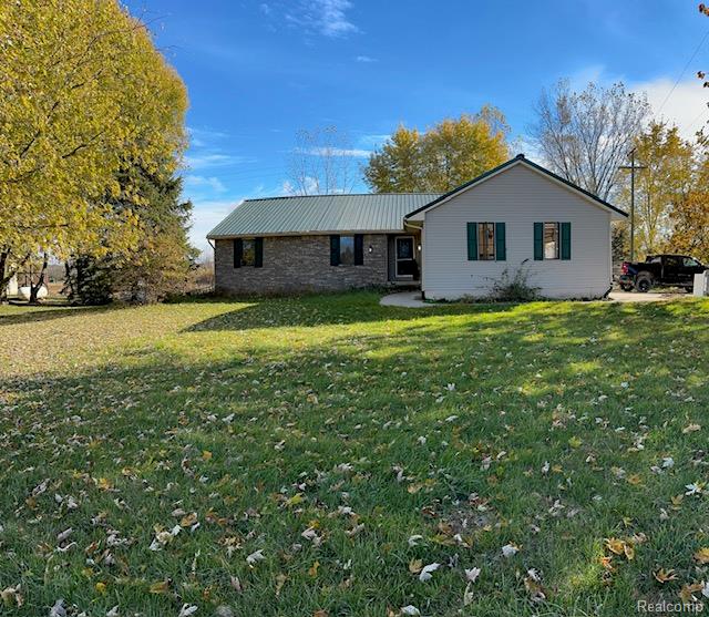 8484 Sober Road, Fowlerville, MI 48836 — front exterior