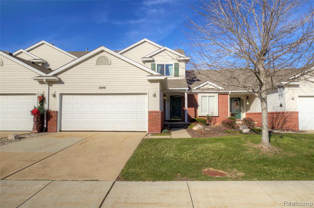 1040 Spirea, Howell, MI 48843 — front exterior