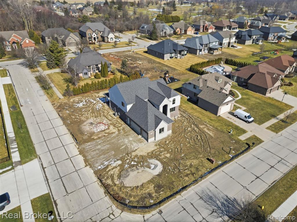 View of property location with nearby suburban area