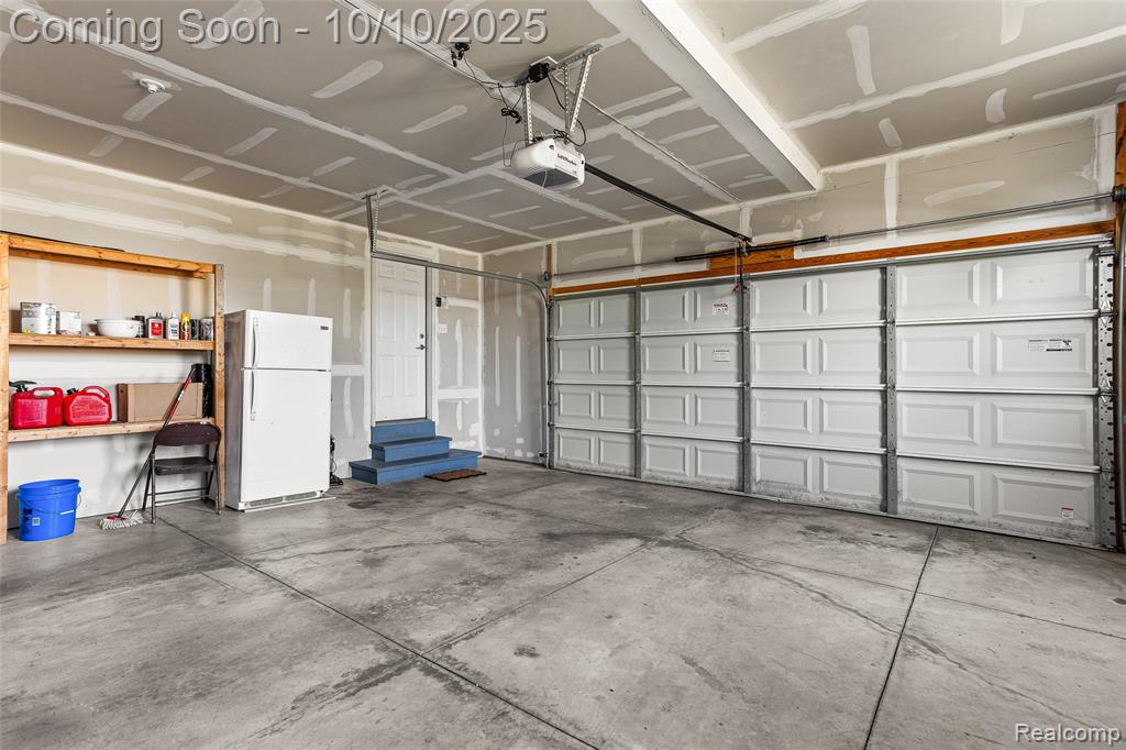 57797 Village Drive, New Hudson, MI 48165 — Photo 45