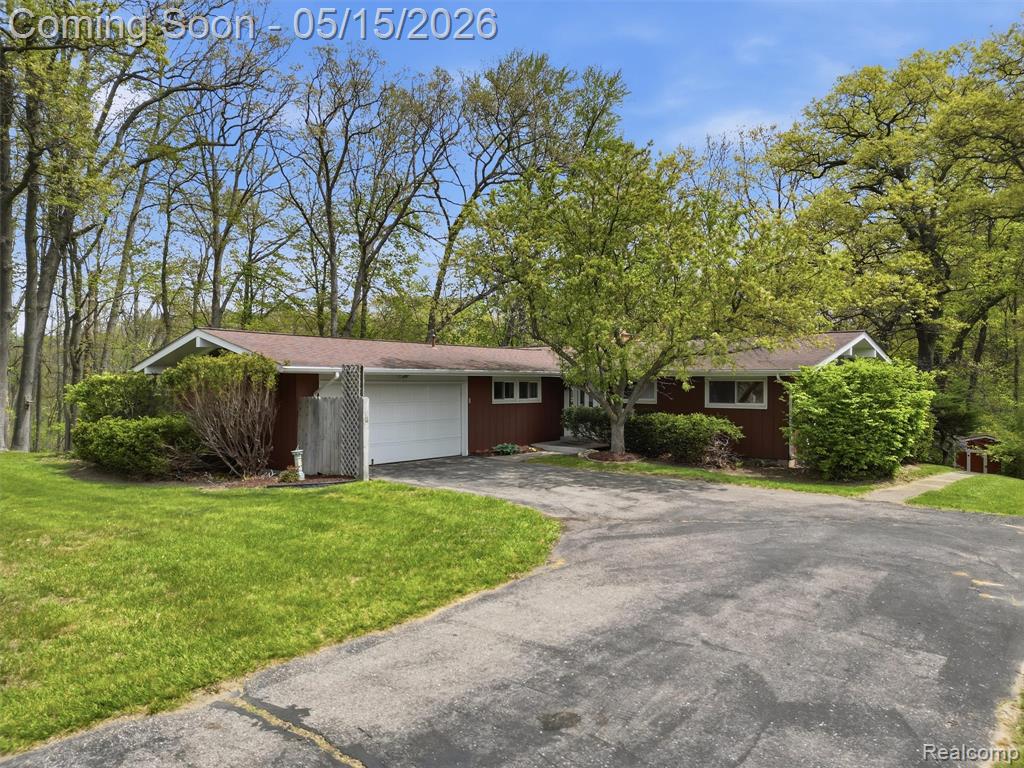 8645 Fieldcrest Drive, Brighton, MI 48116 — front exterior