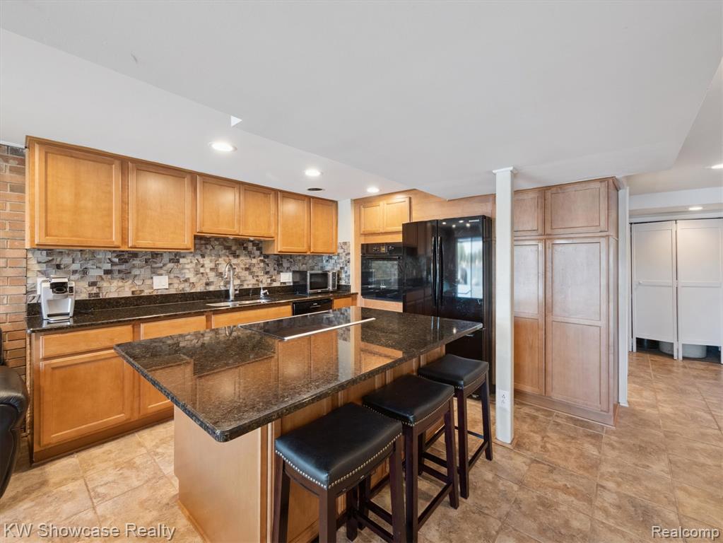 688 Wolverine Drive, Walled Lake, MI 48390 — Photo 24