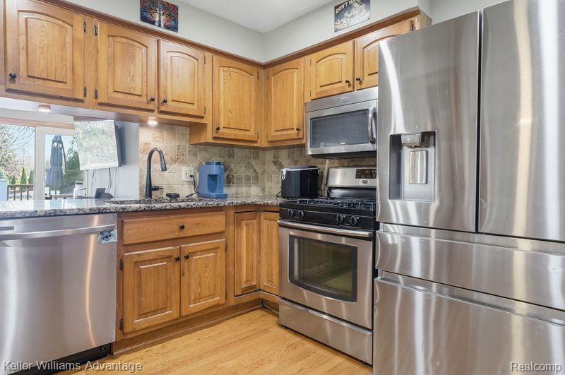 1210 Craven Drive, Highland, MI 48356 — Photo 15