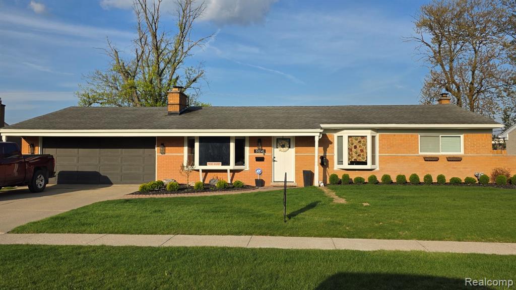 51241 Kingwood Drive, Shelby Twp, MI 48316 — front exterior