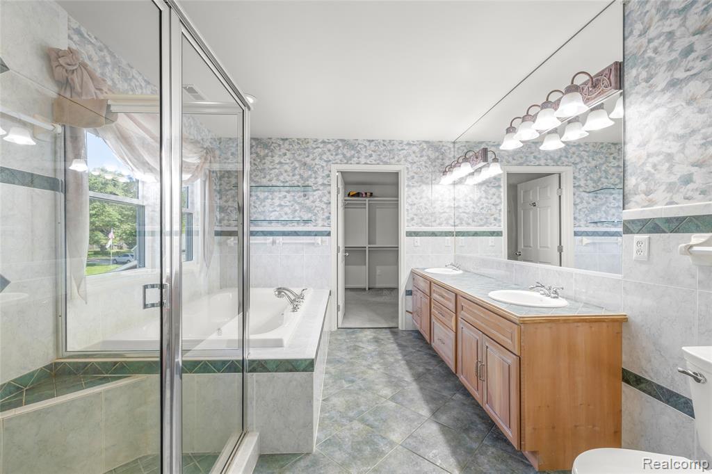 4333 Hunters Drive, Highland, MI 48356 — Photo 32