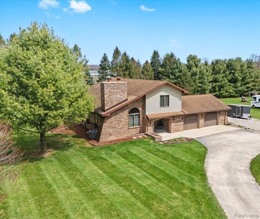 1415 ROSE CENTER Road, Fenton, MI 48430 — front exterior