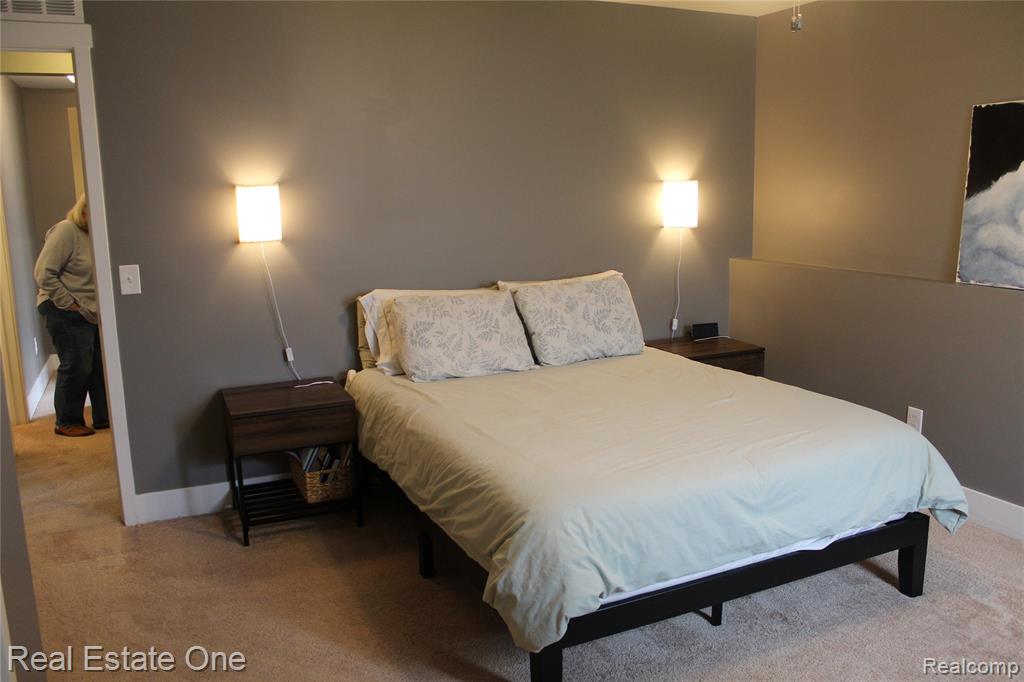 8662 Pinnebog River Drive, Fowlerville, MI 48836 — Photo 17