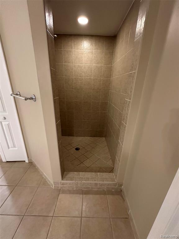 Full bath with a shower stall