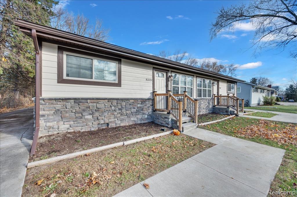8365 21 Mile Road, Shelby Twp, MI 48317 — front exterior