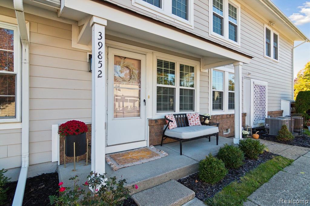 39852 VILLAGE WOOD Circle, Novi, MI — front exterior