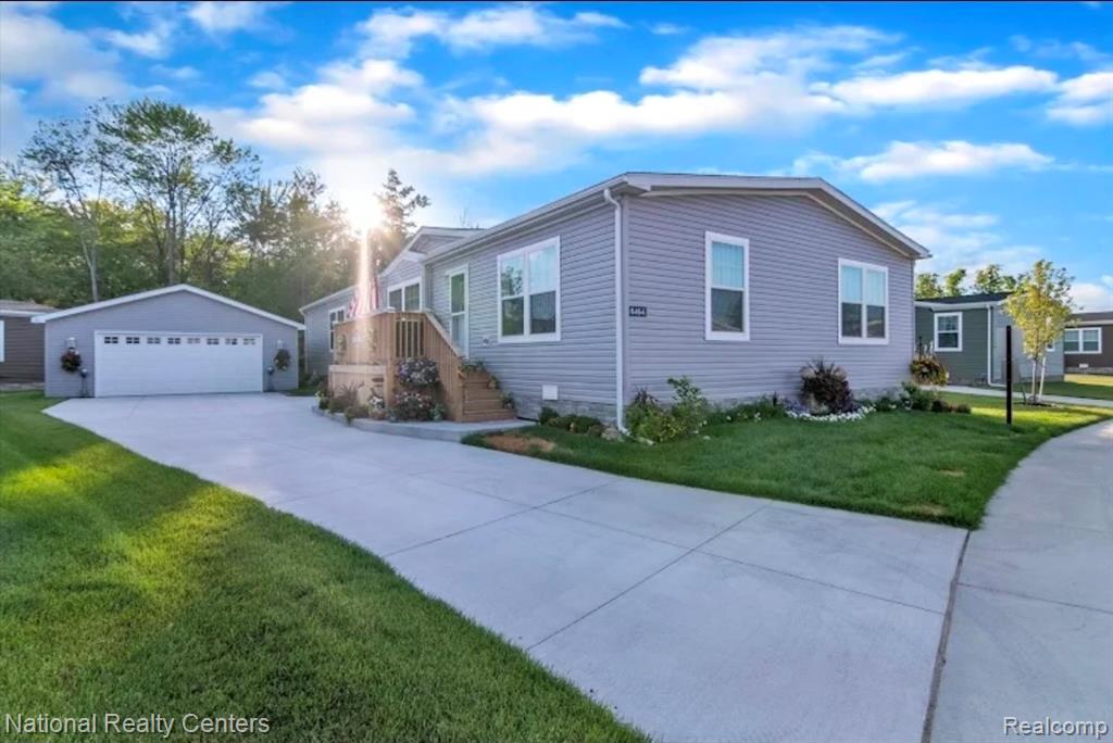 8464 S. Brookston Drive, Willis, MI 48191 — front exterior