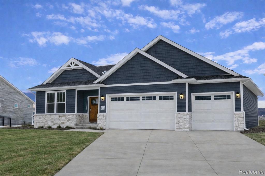 659 ROUND ROCK DR, Howell, MI 48843 — front exterior
