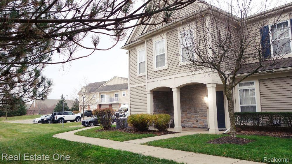 11211 ADDINGTON Drive, 139, Commerce Twp, MI 48390 — front exterior