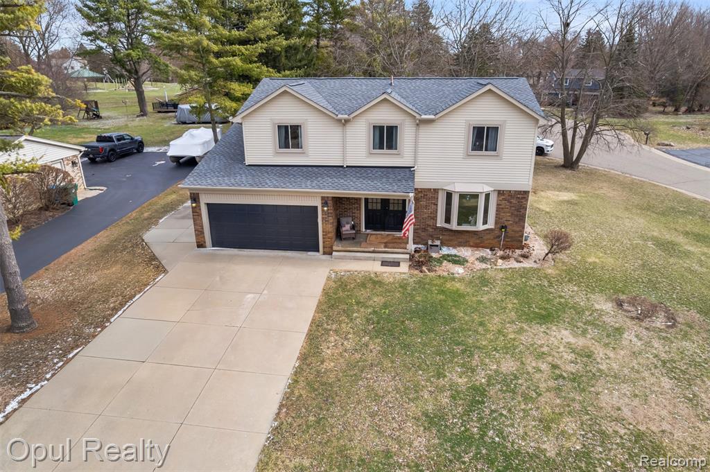 4748 Ravinewood Drive, Commerce Twp, MI 48382 — Photo 3