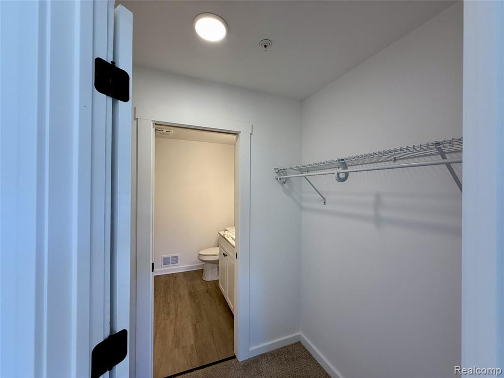 435 Village Drive, Walled Lake, MI 48390 — Photo 19