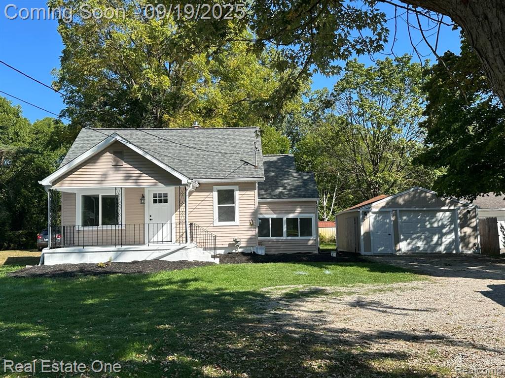 6089 Lapeer Road, Burton, MI 48509 — front exterior