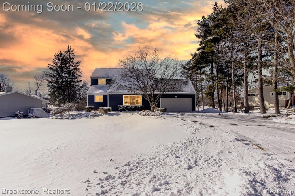 4188 Loch Drive, Highland, MI — front exterior