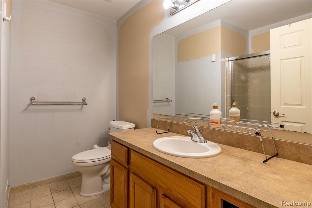 868 WOODHAVEN Drive, Commerce Twp, MI 48390 — Photo 18