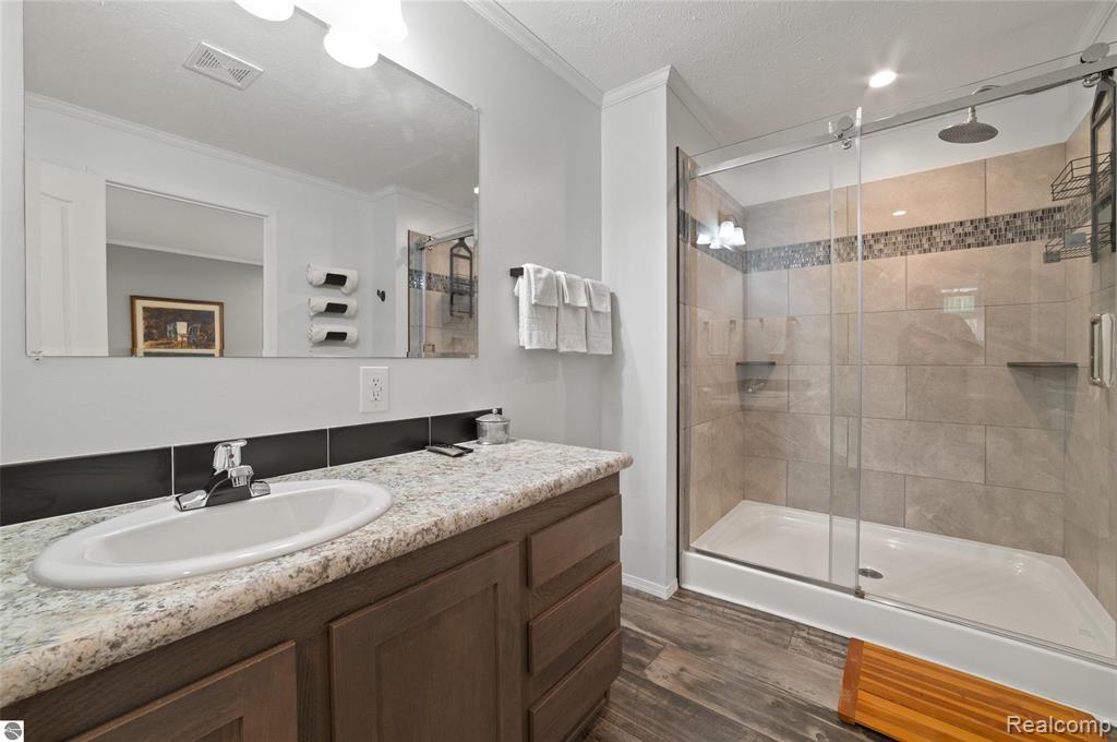 9710 S Fawn Lane NE, Mancelona, MI 49659 — Photo 17