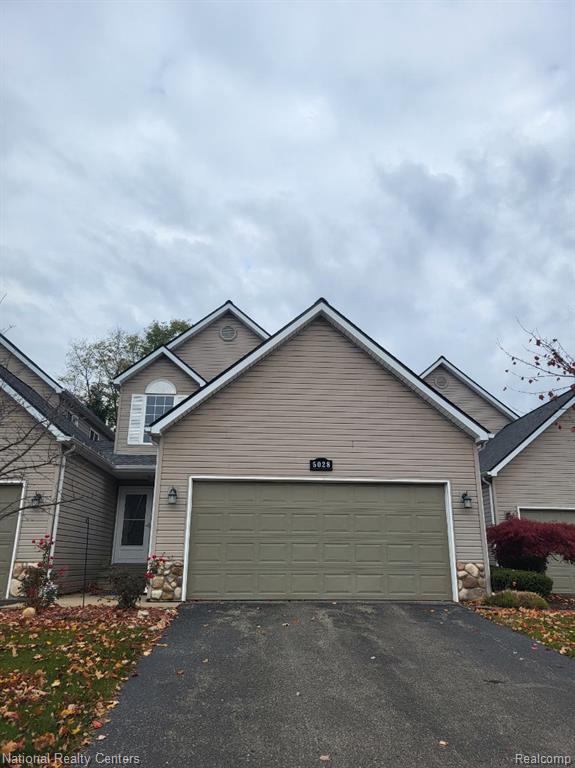 5028 Clintonville Pines Drive, Clarkston, MI — front exterior