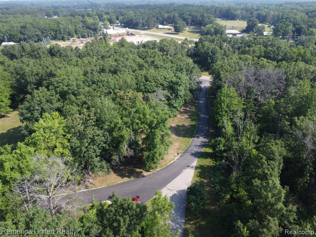 VL Pondside Dr Lot 23, Farwell, MI 48622 — Photo 31