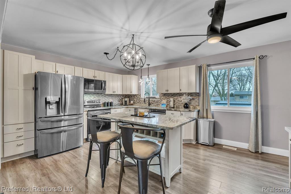 8680 WAR BONNET Drive, Commerce Twp, MI 48382 — Photo 11