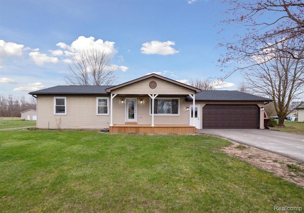 5469 HOGBACK Road, Fowlerville, MI 48836 — front exterior