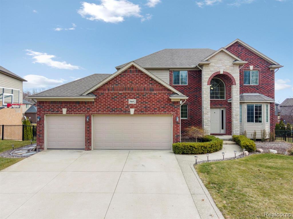 50692 Pinnacle Woods Lane, Macomb, MI 48042 — front exterior