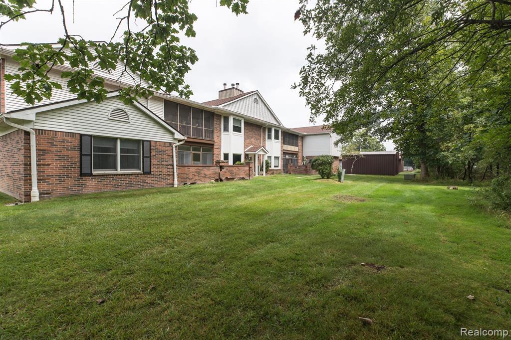 8629 MATHIAS Drive, 48, Grosse Ile, MI 48138 — front exterior