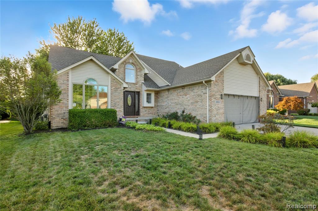 48821 Tremont Drive, Macomb, MI 48044 — front exterior