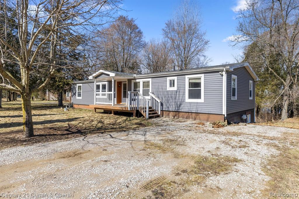 8878 RIVER VALLEY Road, Brighton, MI 48116 — front exterior