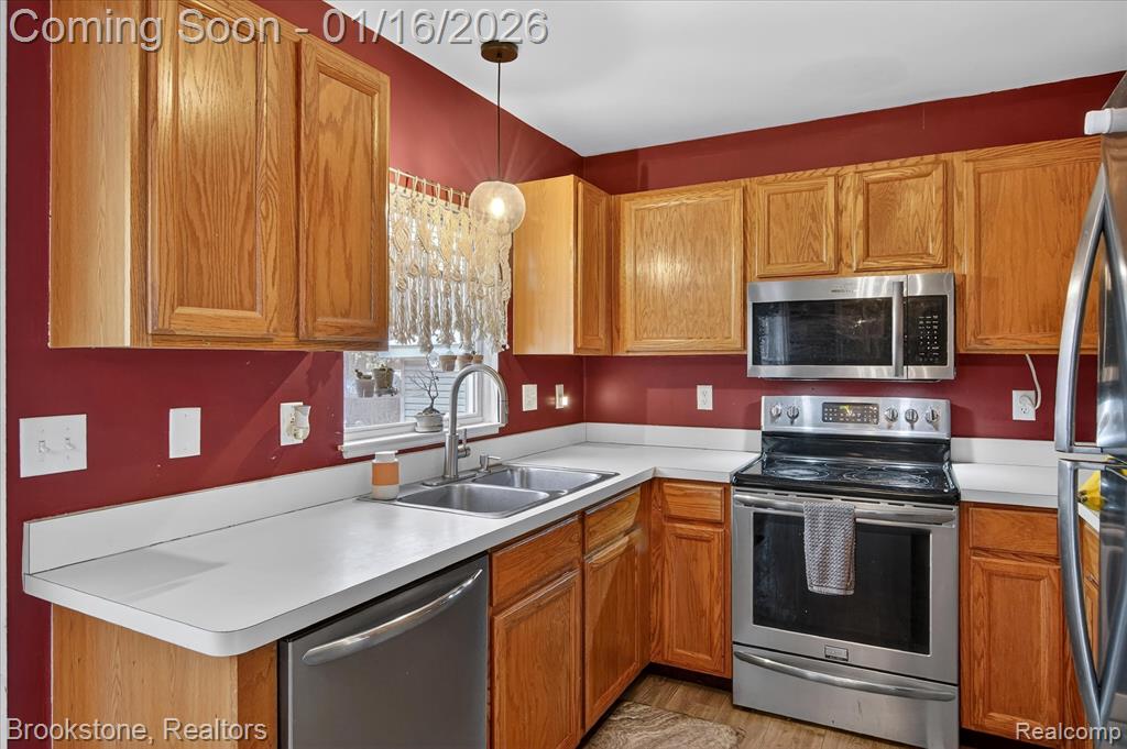 875 Adelaide Drive, Wolverine Lake, MI 48390 — Photo 17