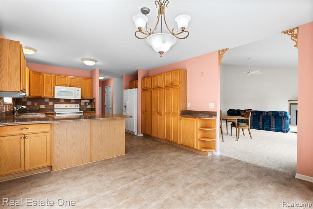 9305 Rotondo Drive, Howell, MI 48855 — Photo 38
