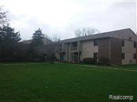 5400 Maple Ridge, 14, Haslett, MI 48840 — front exterior