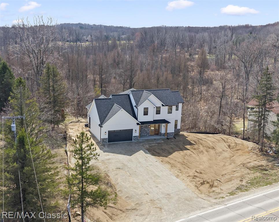 3800 E. Coon Lake Road, Howell, MI 48843 — front exterior