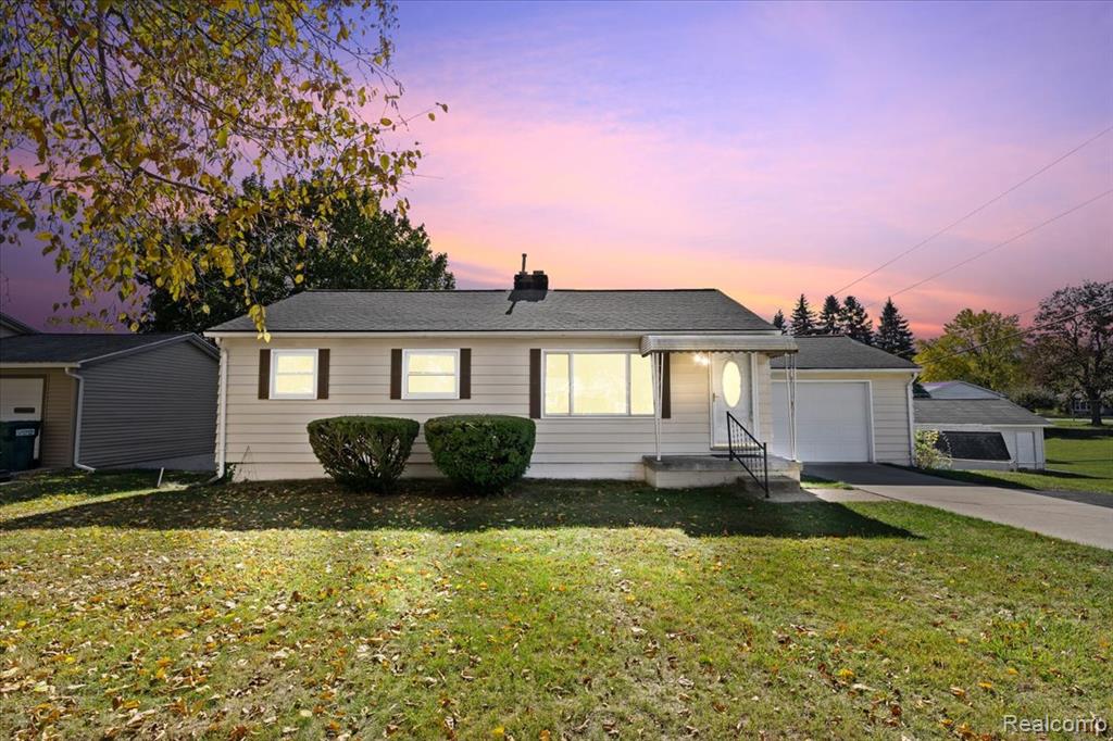 397 Pocahontas Trail, Oxford, MI 48371 — front exterior
