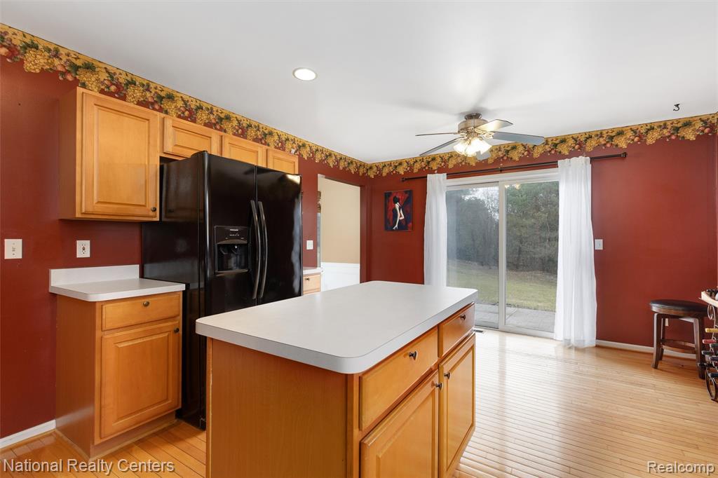 678 Joshua Drive, Highland, MI 48356 — Photo 12