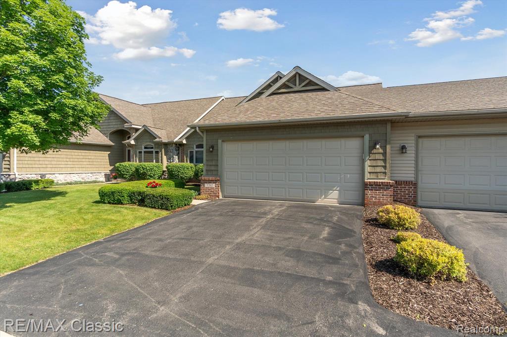 1202 ARBOR RIDGE Drive, 2, Brighton, MI 48116 — Photo 4
