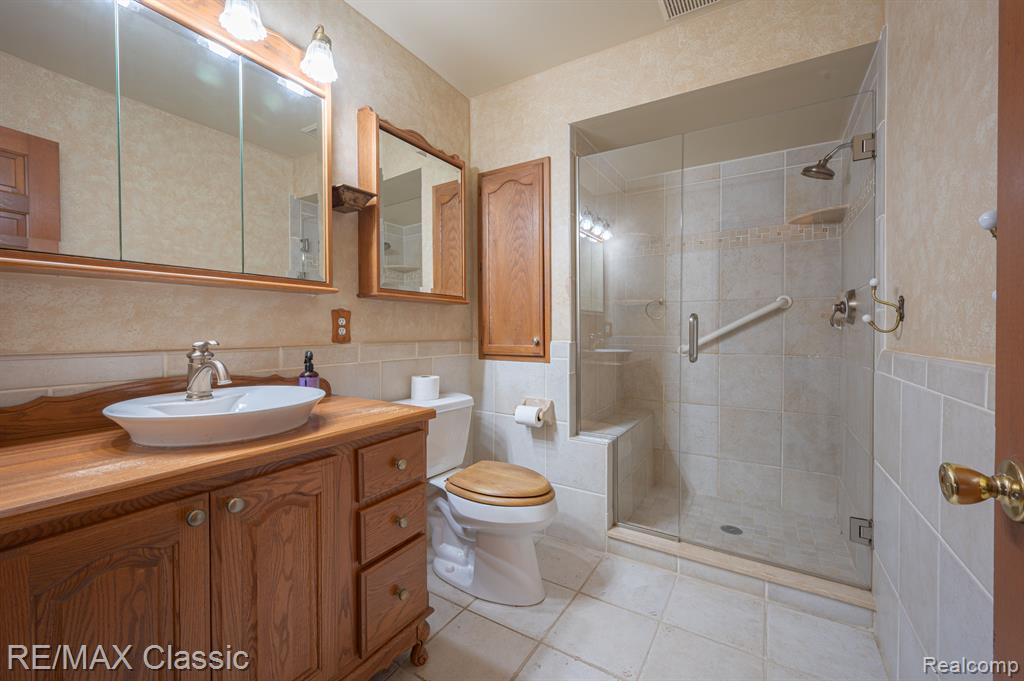 1049 ELMWOOD Drive, 13, Brighton, MI 48116 — Photo 16