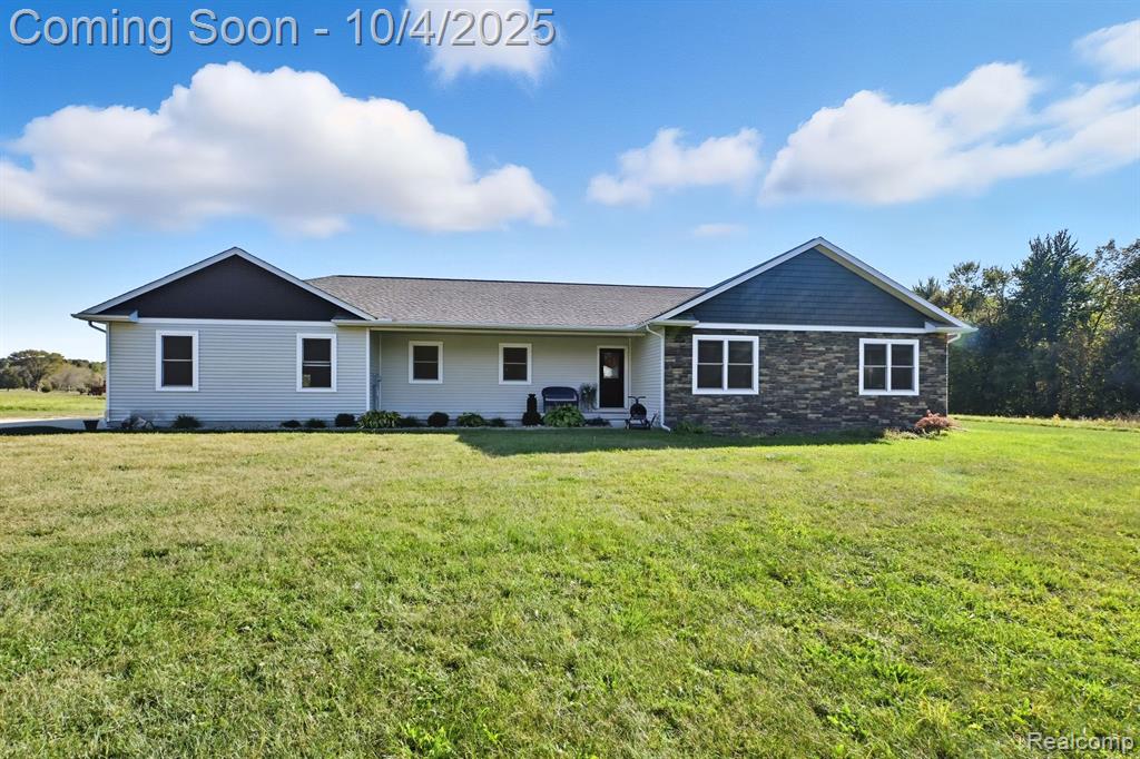 12600 Hibner Road, Hartland, MI 48353 — front exterior