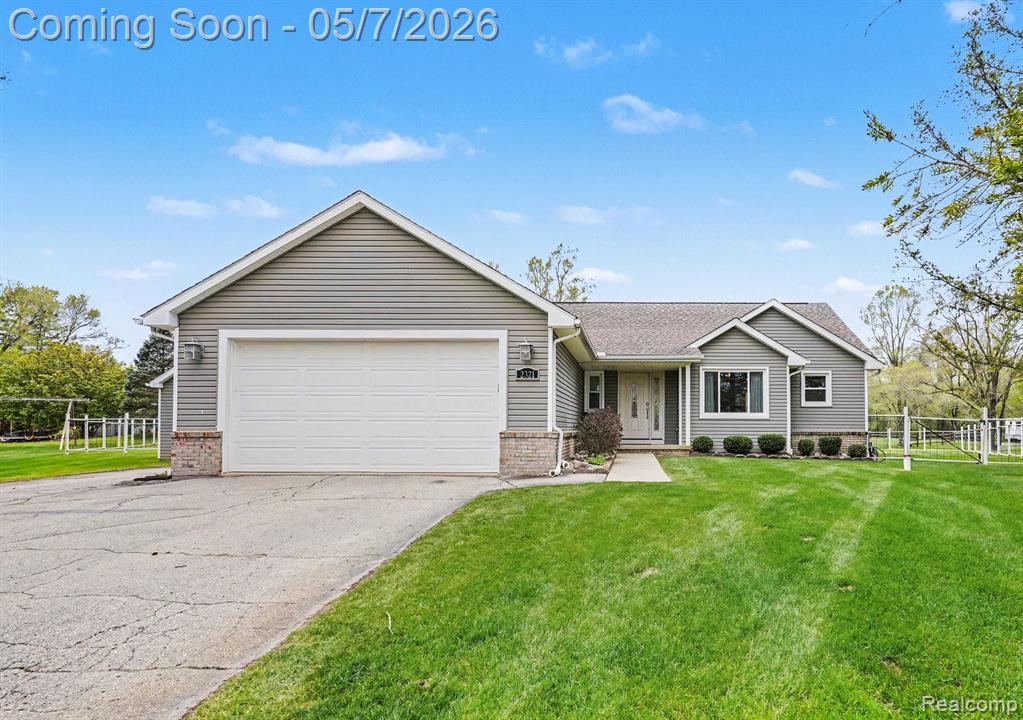 2321 Foxmore Circle, Highland, MI 48356 — front exterior