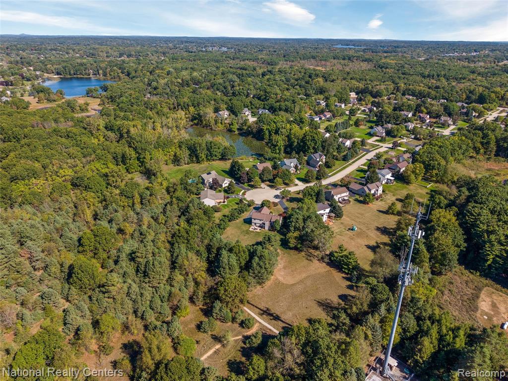 678 Joshua Drive, Highland, MI 48356 — Photo 47