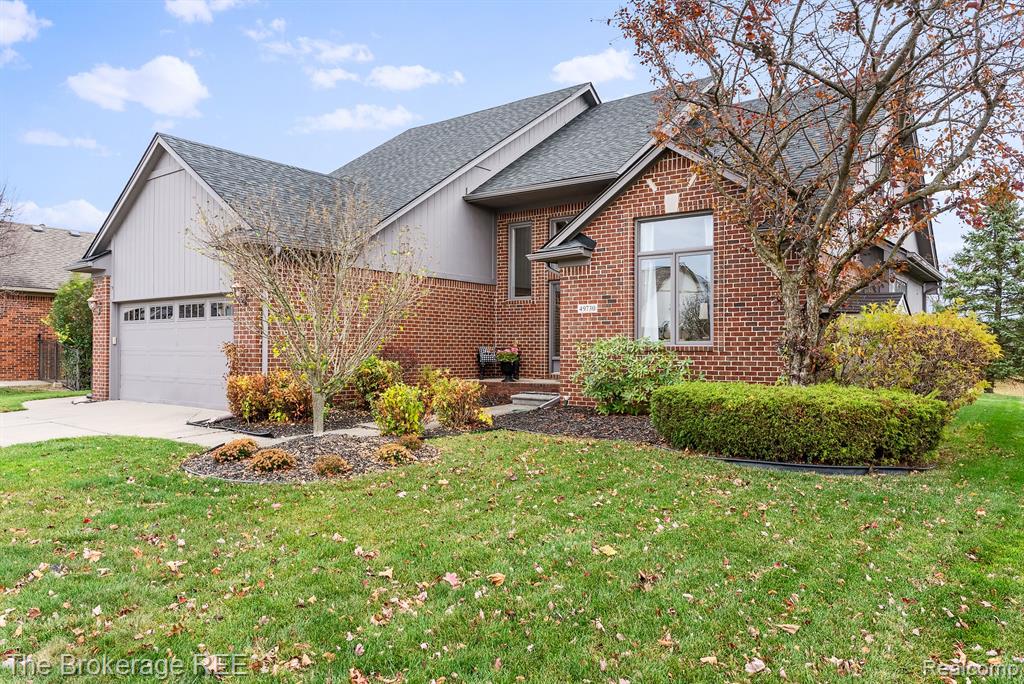 49730 WILLOWOOD Drive, Macomb, MI 48044 — front exterior