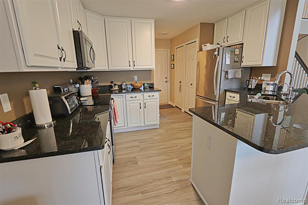 10139 Ridge Run Street, 9, Howell, MI 48855 — Photo 13