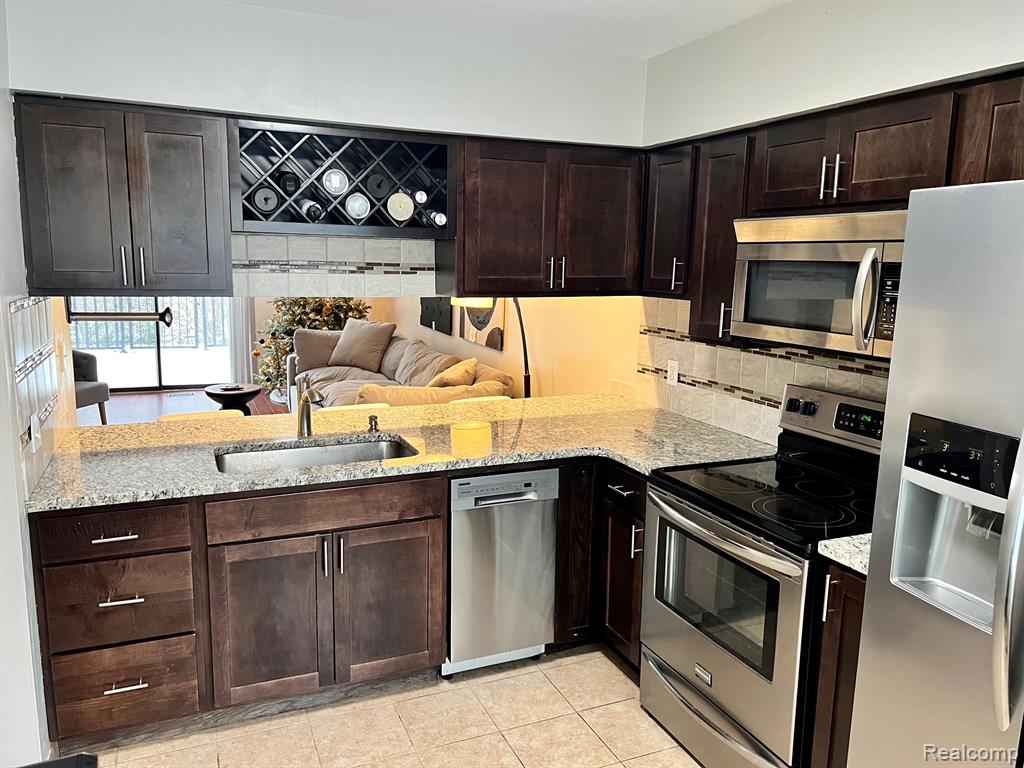 1623 WIMBLEDON Drive, 16, Walled Lake, MI 48390 — Photo 2