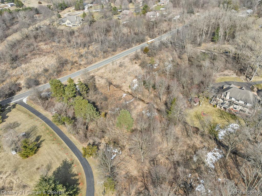 7442 Six Mile Rd, Northville, MI 48167 — front exterior