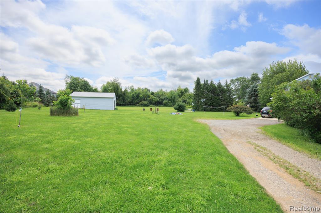 52909 10 Mile Road, South Lyon, MI 48178 — Photo 48