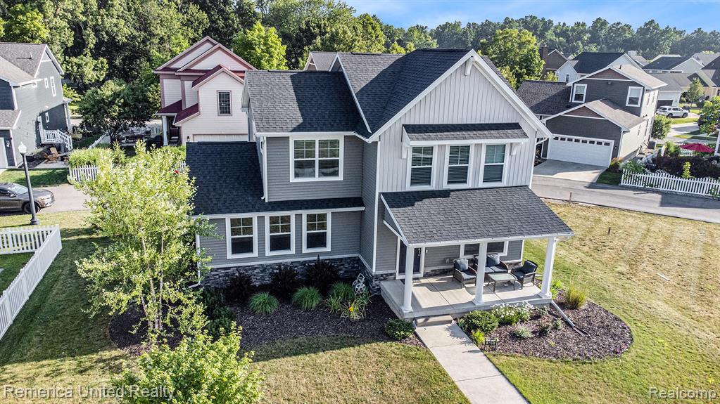 631 Grafton Lane, Howell, MI 48855 — front exterior