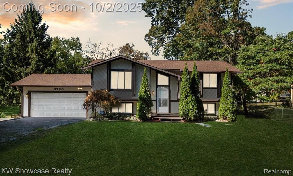 8760 Cooley Beach Drive, White Lake, MI — front exterior