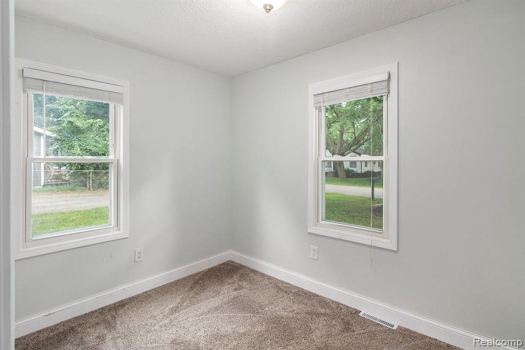 770 Brushwood Drive, Wolverine Lake, MI 48390 — Photo 11